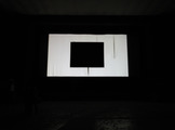Crna slika, 2012., ambijentalna video instalacija; crno platno (300 x400 cm) na bijelom platnu (500 x 1200 cm), video projekcija